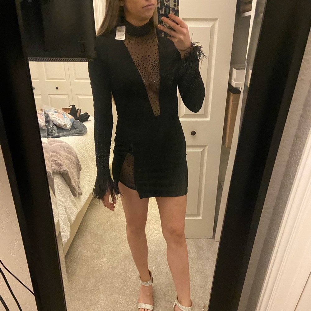 Black beaded and feathered dress worn once